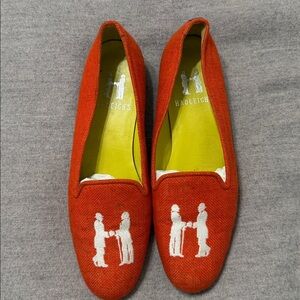 Hadleigh's Orange Loafers with White Silhouette Design